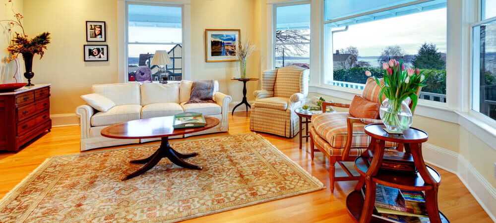 golden yellow rugs on light color hardwood floors