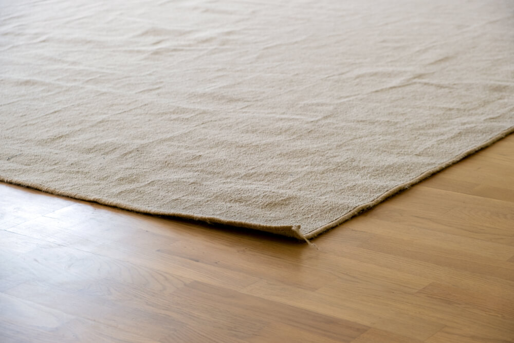 how to keep rug corners down on hardwood floors